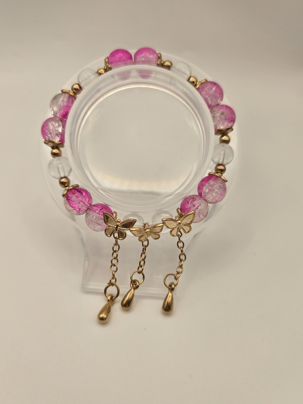 10mm Hand Crafted Glass Pink Crackle Bead Bracelet with Gold Butterfly Charms